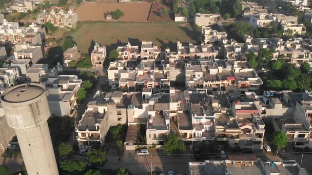 An aerial over the Basant Avenue, An Urban City located in Ludiana Punjab India, skyline including rooftop water tower.