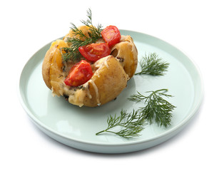 Plate with tasty stuffed potato on white background