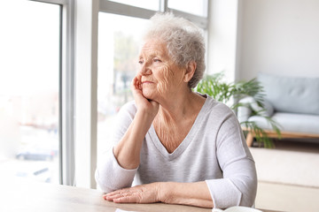 Portrait of senior woman at home