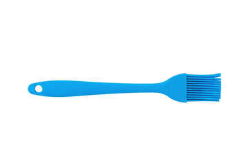 Blue rubber or silicone brush with plastic handle for confectionery isolated on white background. Top view
