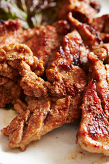 Grilling Korean marinated pork 