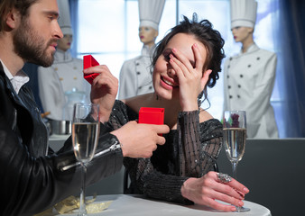 A man in love gives his girlfriend a gift