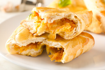 Tasty samosas on plate, closeup