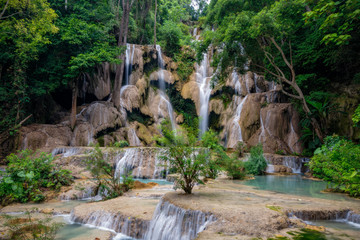 The Kuang Si Falls sometimes spelled Kuang Xi or known as Tat Kuang Si Waterfalls located in Luang...