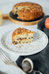 Piece of cake with pear and chocolate. Sliced homemade cake