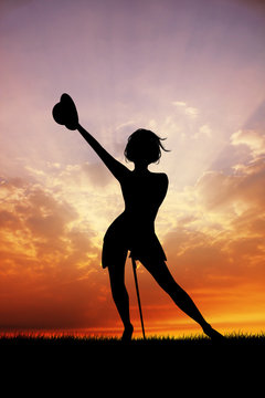 woman dances tip tap at sunset