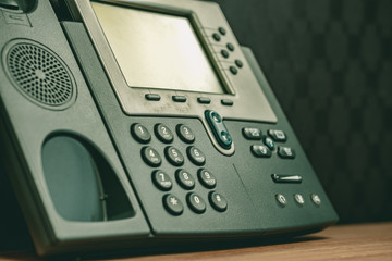 Close up soft focus on ip phone devices at office desk