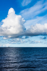 SEA LANDSCAPE WITH HORIZON WITH HEAVEN WITH CLOUDS IN NORTH SEA