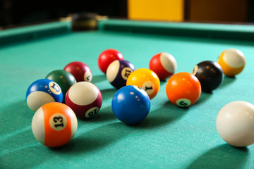 Billiard balls on table in club