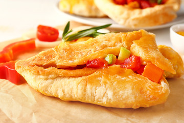 Delicious vegetable samosa on parchment