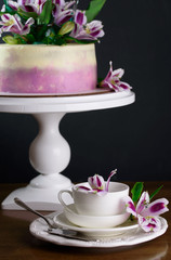 Delicious cake with fresh flowers