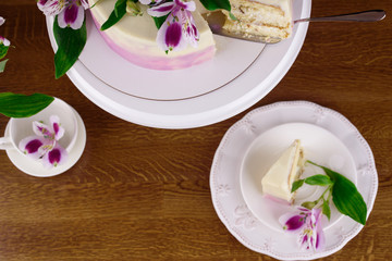 Delicious cake with fresh flowers
