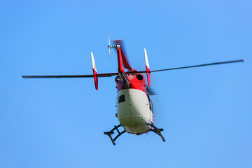 a helicopter flying from behind
