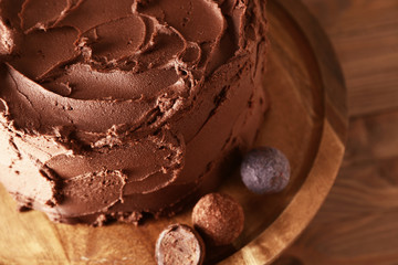 Tasty chocolate cake on stand, closeup