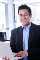 Fototapeta premium Portrait of happy businessman