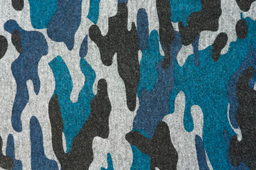 Blue black camouflage fabric texture background