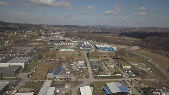 Gorlice, Poland - 3 9 2019: Industrial region of the Carpathian city. Top view of the refinery and auxiliary buildings. Video shot by drone or quadrocopter. Vanity of the day at the factory. Planning 