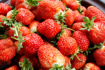 Strawberry. Macro of fresh organic red berries. Fruit background. Close-up.