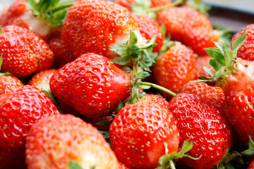 Strawberry. Macro of fresh organic red berries. Fruit background. Close-up.