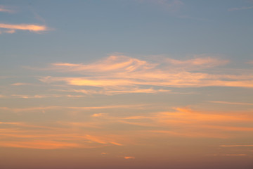 some light clouds in the light of a sunset, for backgrounds