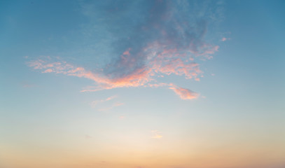 some light clouds in the light of a sunset, for backgrounds
