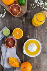 Fresh juicy oranges halved,limes, grapefruits, fresh squeezed orange juice
