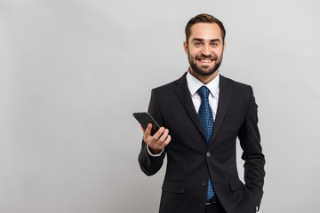 Attractive young businessman wearing suit
