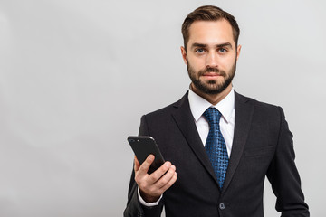 Attractive young businessman wearing suit