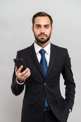 Attractive young businessman wearing suit