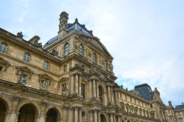 Fototapeta na wymiar Famous Paris Louvre. Fragment of Louvre Museum 
