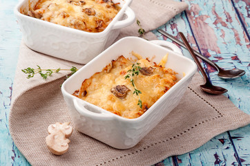 Traditional cheese casserole in a portion plate. Close up and horizontal view.