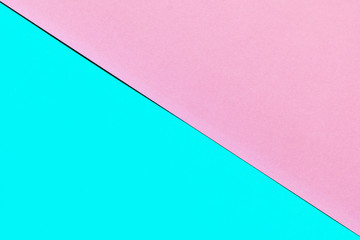 Abstract background of pink and blue colored paper. Two colors with copy space.