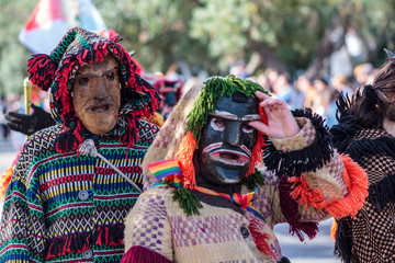 Masked men (Caretos) at Iberian Mask Festival Parade in Lisbon