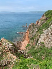 Fototapeta premium Russia, Vladivostok. The South-Eastern coast of the island of Shkot in summer morning