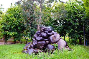 Fototapeta na wymiar Beautiful fountain of stones in the garden