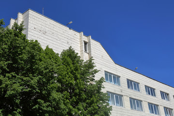 Obraz premium Part of the facade of an industrial building in the production area