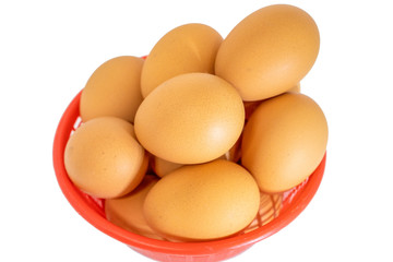 eggs isolated on white background on red basket