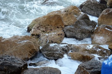 waves washing onto the rocks