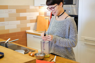 Portrait of woman cooking dessert.