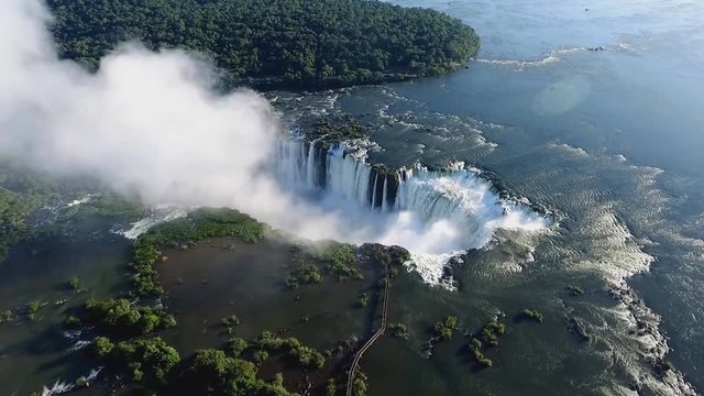 The Iguazu Falls are waterfalls of the Iguazu River on the border of Argentina and Brazil. They are the largest waterfalls system in the world. (aerial photography)