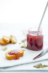 Quick light Breakfast with cookies and jam, healthy morning snack with baked cantuccini and confiture