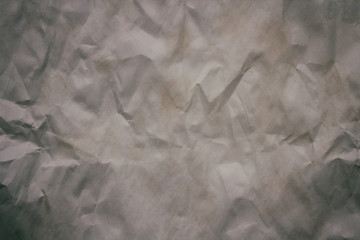 Old crumpled paper texture background.  Creases and cracks. Old design pattern. 