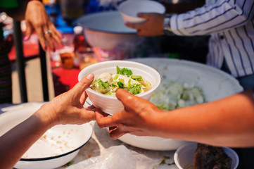 the concept of begging and hunger : Hunger problems of the poor have been donated food to reduce hunger : the concept of food shortage in the world : Donate Food with Love and Hope to the Poor
