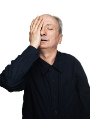 Elderly man suffers from headache