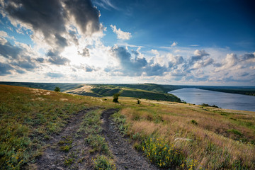 Naklejka premium Amazing view of summer steppe with lake beautiful landscape