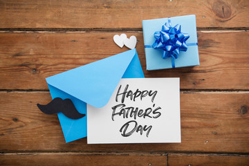 Father's day card and envelope with mustache, hearts and present