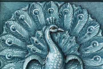 blue color india temple peacock relief
