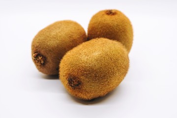 Ripe kiwi fruit on white background
