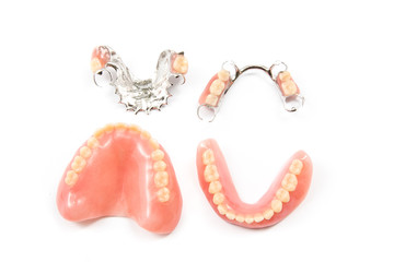 removable partial denture on white background.