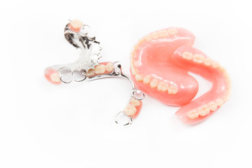 removable partial denture on white background.